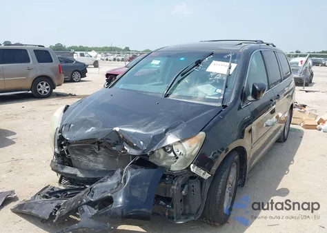 2010 Honda Odyssey Touring z USA, uszkodzony, nr VIN 5FNRL3H90AB070720